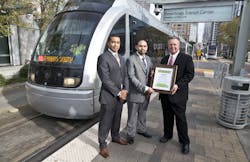 From left to right, Armand Echetebu, regional sales manager for GDF Suez Energy Resources; Miguel Zavala, energy and facilities manager for Houston Metro; and J.D. Burrows, vice president of marketing for GDF Suez Energy Resources. From left to right, Armand Echetebu, regional sales manager for GDF Suez Energy Resources; Miguel Zavala, energy and facilities manager for Houston Metro; and J.D. Burrows, vice president of marketing for GDF Suez Energy Resources.