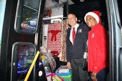 SEPTA General Manager Jeff Knueppel joined SEPTA Elf Maxine Dobbins in loading toys on the festive buses. SEPTA General Manager Jeff Knueppel joined SEPTA Elf Maxine Dobbins in loading toys on the festive buses.