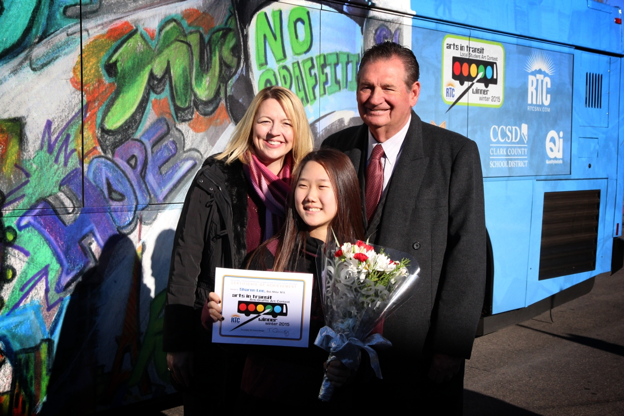 Bob Miller Middle School Principal Nicole Donadio, former Nevada Governor Bob Miller and student winner Sharon Lee celebrate the RTC&rsquo;s ninth annual anti-graffiti art contest.