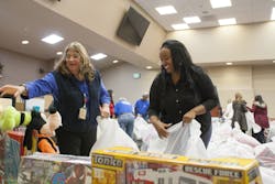 Each of the participating charities left the bagging party with more than a dozen large bags loaded with dolls, games, footballs and teddy bears, as well as toys and clothes for babies and items for teenagers, too, all to benefit the local families they serve. Each of the participating charities left the bagging party with more than a dozen large bags loaded with dolls, games, footballs and teddy bears, as well as toys and clothes for babies and items for teenagers, too, all to benefit the local families they serve.