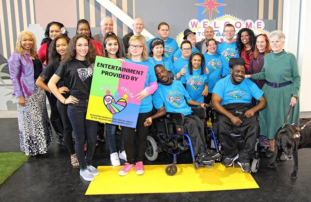 Clark County Commission Chairman Steve Sisolak, Clark County Commissioner and RTC Chairman Larry Brown, Sletten Construction Vice President Chris Caluya and Blindconnect Executive Director Jean Peyton commemorate the opening of the Regional Transportation Commission of Southern Nevada&rsquo;s (RTC) Mobility Training Center with Kiss Is 4Kidz, an organization that provides creative and performing arts training and opportunities to individuals with special needs.