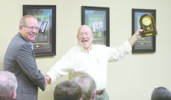 AngelTrax president Richie Howard with top sales rep Ray Fair. AngelTrax president Richie Howard with top sales rep Ray Fair.