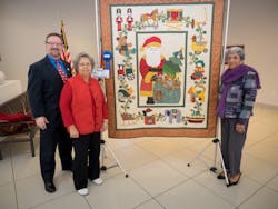 Carmen Zapata (r.), 1st Place in Fibers Craft at the Bravo for ArtAbility exhibit on display in The Grand at VIA Villa, is joined by VIA President/CEO Jeffrey C. Arndt (l.) and her friend, Tillie Gonzalez, at the reception for the exhibit.