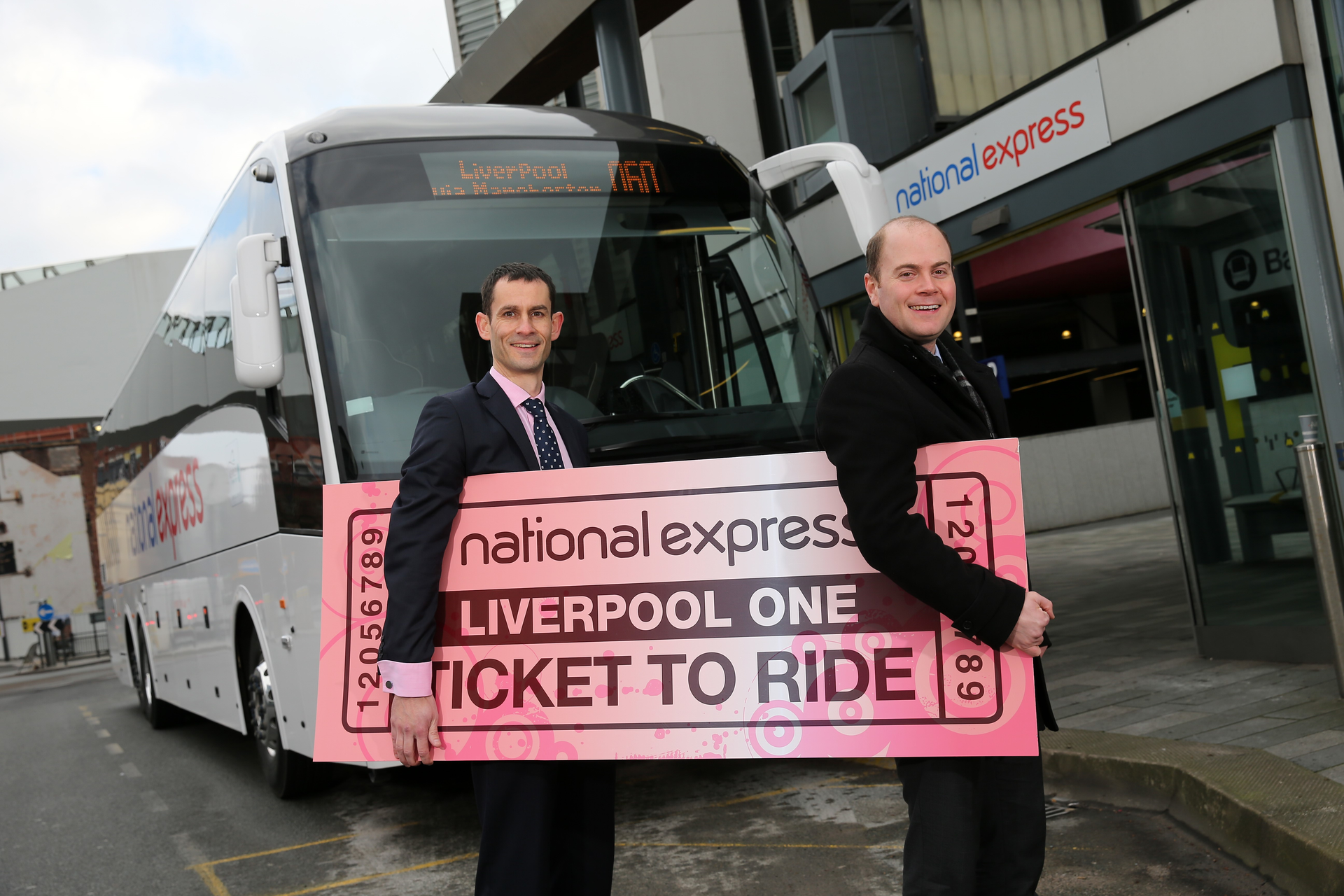 National Express UK Coach finance director Ed Lunt and chair of Merseytravel Councillor Liam Robinson .