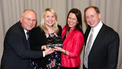 Photograph shows group communications manager Bryan Bannister, assistant HR manager Sara Brookes, HR director Madi Pilgrim and fleet presentation manager Peter Sleaford.