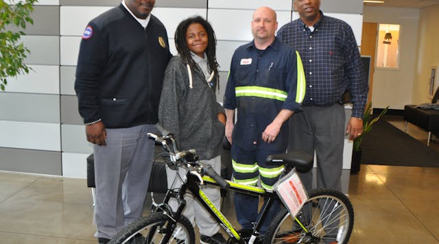 Pictured left to right: Andre Peterson, COTA transportation services supervisor; Osman Mayo; Andrew Riley, COTA coach repair; and Jimmy Pugh, COTA vehicle maintenance supervisor.