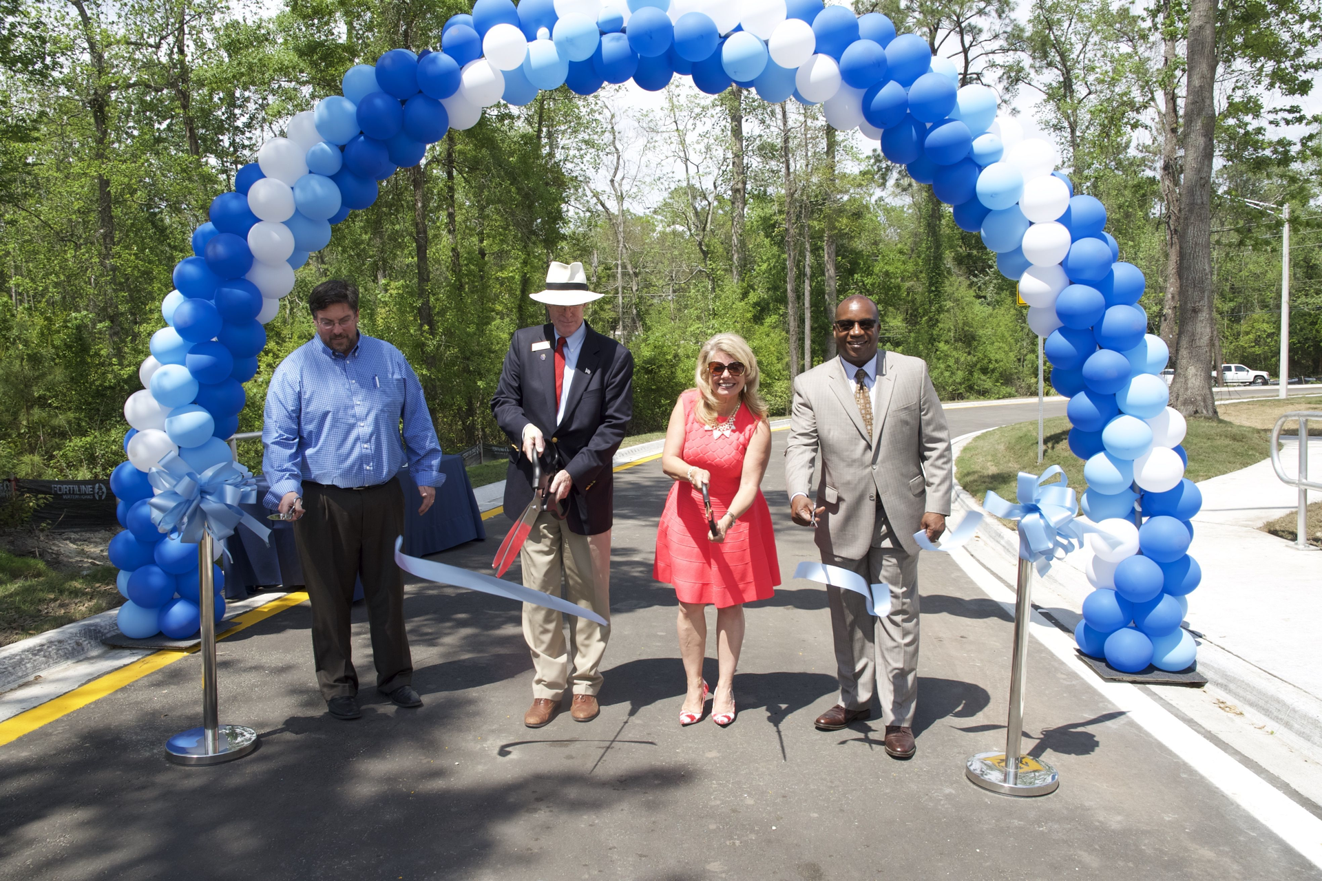 Ribbon cutting at the new turn lane at the southeast corner of the intersection of Old St. Augustine Road and Greenland Road.