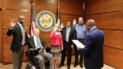 Houston Mayor Sylvester Turner administers the oath of office to new Metro board appointees. Houston Mayor Sylvester Turner administers the oath of office to new Metro board appointees.