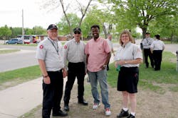 Metro Bus Fixed Route drivers visit before the competition. Shon Davis (far left) placed third. Gayle Rekowski (far right) placed first. Adam Ploof (not pictured) placed second in the large bus division. Metro Bus Fixed Route drivers visit before the competition. Shon Davis (far left) placed third. Gayle Rekowski (far right) placed first. Adam Ploof (not pictured) placed second in the large bus division.