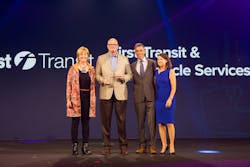 First Transit&rsquo;s Todd Hawkins accepts the 2016 Infor Excellence in Action Award in New York, New York, Monday, July 11, 2016. From left: Mary Trick, chief customer officer, Infor; Todd Hawkins, senior vice president, First Transit; Duncan Angove, president, Infor and Pam Murphy, chief operating officer, Infor.