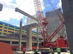 Massive concrete beams lay foundation for elevated Brightline tracks. Massive concrete beams lay foundation for elevated Brightline tracks.