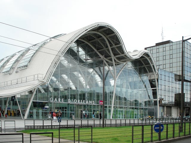 The entire western fa&ccedil;ade of the Orleans Train Station consists of large clear glass panels, flooding the interior with daylight.