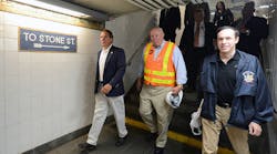 Governor Andrew M. Cuomo, MTA Chairman &amp; CEO Thomas F. Prendergast and NYS Department of Health Commissioner Howard A. Zucker, M.D. placed anti-mosquito larvicide in an area of standing water at the Whitehall St station on Tue., August 2, 2016.