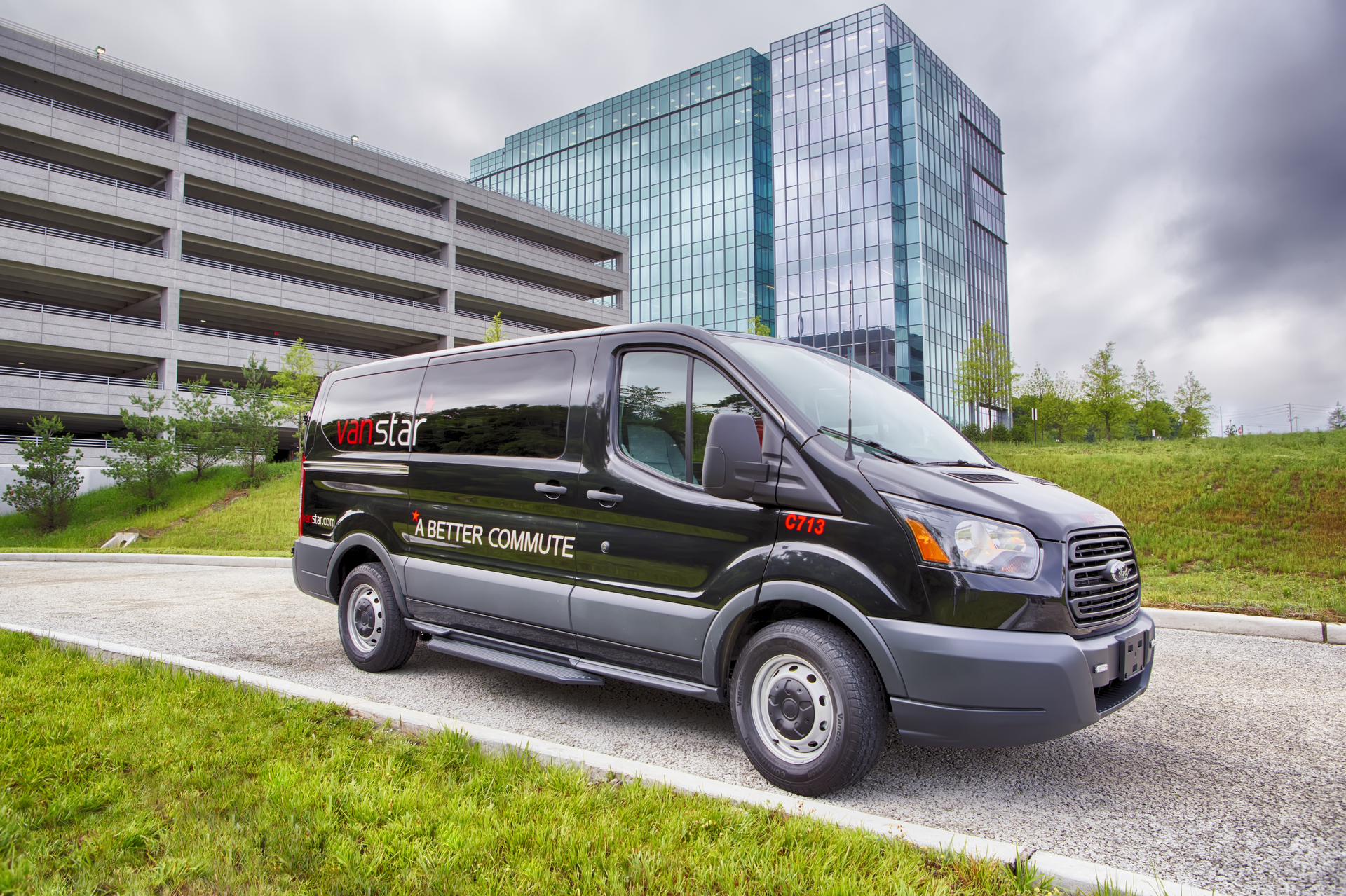 Close up of Black Van with One Franklin Park in Background 57a89f4049d61