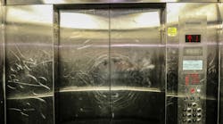 Elevator cab vandalism. Elevator cab vandalism.