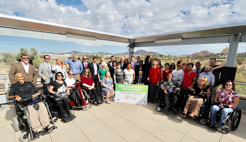 Members of the community and design and construction teams celebrate the announcement of the new Valley Metro Rail station with Phoenix Mayor Greg Stanton, Phoenix Councilmember and Valley Metro RPTA Board Chair Thelda Williams, Phoenix Vice Mayor Kate Gallego, CTC Chair Congressman Ed Pastor and CTC member and Ability360 President & CEO Phil Pangrazio.