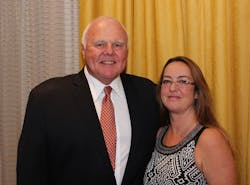 Tanya Zitzelberger recently received the prestigious Heart of the Industry Award from the New York School Bus Contractors Association. On hand to present the award was Reichenbach Enterprises President Rick Reichenbach, whose company sponsors the annual award.