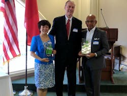 David Griffith, chairman of the Long Beach-Qingdao Association (middle) gives BYD (left) and Long Beach Transit the CleanTech Award. David Griffith, chairman of the Long Beach-Qingdao Association (middle) gives BYD (left) and Long Beach Transit the CleanTech Award.