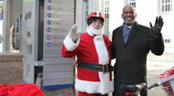 Metro CEO Dwight A. Ferrell had a little help from Bicycle Santa passing out stocking filled with goodies to thank all the 'good boys and girls' who know riding Metro is the best way to go all year long.