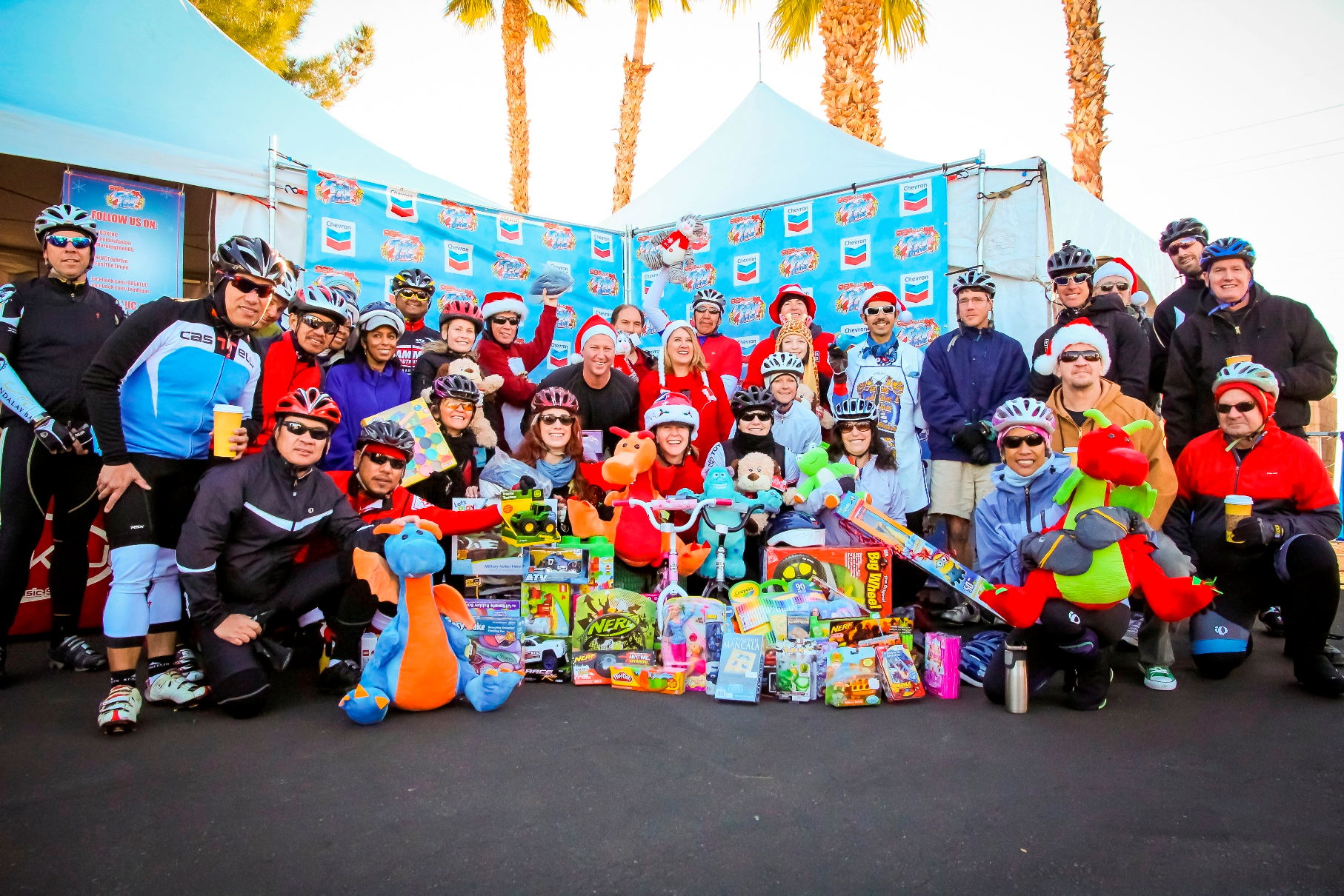 Past years riders donate toys to Help of Southern Nevada for 98 5 KLUC's Chet Buchanan The Morning Zoo toy drive.