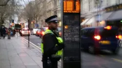 A Safer Travel police officer patrolling Colmore Row in Birmingham.