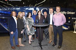 Winners gathered with MCI at the company's booth are from left: David Kestenbaum, who developed eRating, a program of the University of Vermont's Certification for Sustainable Transportation; Elaine Fickett, president H & L Charter, Ian Smart, MCI President; Jodie Merritt, vice president H & L Charter; Patrick Scully, MCI Executive Vice President of Sales and Marketing; Pat Ziska, MCI Vice President of New Coach Sales; TJ Morgan, president of Citizen Auto Stage, Tucson, Arizona, and Chair of the ABA environmental committee, along with Arrow Stages Lin. Winners gathered with MCI at the company's booth are from left: David Kestenbaum, who developed eRating, a program of the University of Vermont's Certification for Sustainable Transportation; Elaine Fickett, president H & L Charter, Ian Smart, MCI President; Jodie Merritt, vice president H & L Charter; Patrick Scully, MCI Executive Vice President of Sales and Marketing; Pat Ziska, MCI Vice President of New Coach Sales; TJ Morgan, president of Citizen Auto Stage, Tucson, Arizona, and Chair of the ABA environmental committee, along with Arrow Stages Lin.