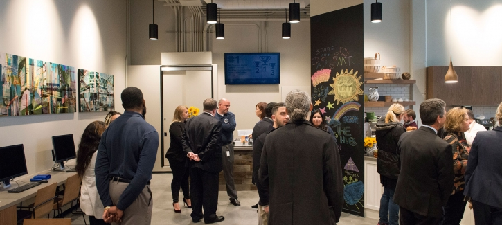 The Hub staff speak with visitors during the center's soft opening event on January 25, 2017. The Hub is a one-stop storefront &ldquo;shop&rdquo; for all the programs and services of MTC, ABAG and the Air District.