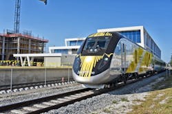 BrightBlue, the first Brightline trainset, passes by the Brightline West Palm Beach Station for the first time. BrightBlue, the first Brightline trainset, passes by the Brightline West Palm Beach Station for the first time.