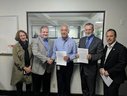 Left to right: Madeline Janis, executive director of transit workers advocacy group Jobs to Move America; James White, director of organizing at the Sheet Metal, Air, Rail and Transportation Workers union; BYD Senior Vice President Macy Neshati; Lancaster Mayor R. Rex Parris; Luther Medina, business manager of SMART Local 105 following successful completion of the card-check process. Left to right: Madeline Janis, executive director of transit workers advocacy group Jobs to Move America; James White, director of organizing at the Sheet Metal, Air, Rail and Transportation Workers union; BYD Senior Vice President Macy Neshati; Lancaster Mayor R. Rex Parris; Luther Medina, business manager of SMART Local 105 following successful completion of the card-check process.