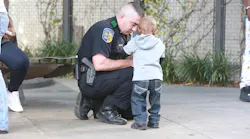 Dallas Area Rapid transit officer with youth.