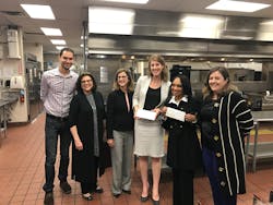 At a media event, the two project partners each received a check for $50, 000. At a media event, the two project partners each received a check for $50, 000.