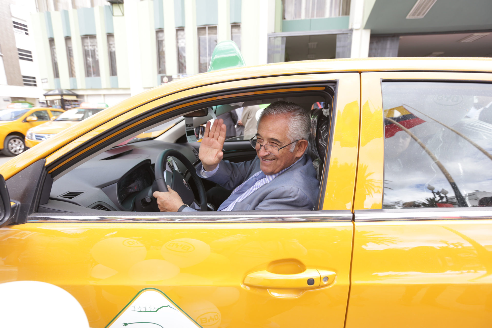 Mayor Bolivar Castillo in BYD e5 taxi.