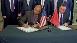 Front Row: Phillip A. Washington, Metro CEO and Chuanhe Zhou, CRRC MA president sign new Metro Red/Purple Line rail car contract. Back Row: Zhongyi An, general manager, CRRC Changchun; Guohua Xi, president, CRRC; Wang Jun, vice president, CRRC; Jia Bo, vice president, CRRC MA.