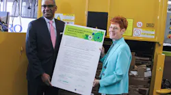 Metro CEO Dwight A. Ferrell and Metro Sustainability & Outreach Manager Kim Lahman recently signed Metro's sustainability policy at an Earth Day event highlighting Metro's initiatives to reduce its environmental footprint.