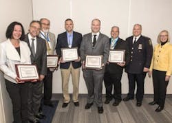 (Left to Right) Michele Salvatore, Metro-North President Joseph Giulietti, Jeff Ballard, Jeffrey Boyle, Andrew McClellan, Brendan Szabo, MTA Police Chief Owen Monaghan, MTA Board's Metro-North Railroad Committee Chair Susan Metzger. (Left to Right) Michele Salvatore, Metro-North President Joseph Giulietti, Jeff Ballard, Jeffrey Boyle, Andrew McClellan, Brendan Szabo, MTA Police Chief Owen Monaghan, MTA Board's Metro-North Railroad Committee Chair Susan Metzger.