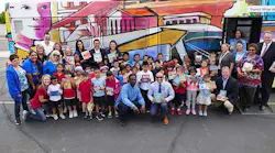 Tempe Mayor Mark Mitchell, Valley Metro CEO Scott Smith, Curry Elementary School Principal Ken White, Valley Metro Bus Operator Jermaine Bethea and Curry Elementary kindergarteners along with representatives from Valley Metro, First Transit, Curry Elementary and Tempe Elementary School District celebrate the Driving for Books donation drive.