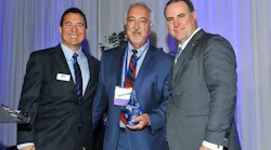 Coalition for Clean Air President & CEO Dr. Joseph Lyou, BYD Heavy Industries Senior Vice President Macy Neshati, and Coalition for Clean Air Board Chair Todd Campbell pose with BYD’s Corporate Leadership Award at the 2017 California Air Quality Awards in Los Angeles on June 9.
