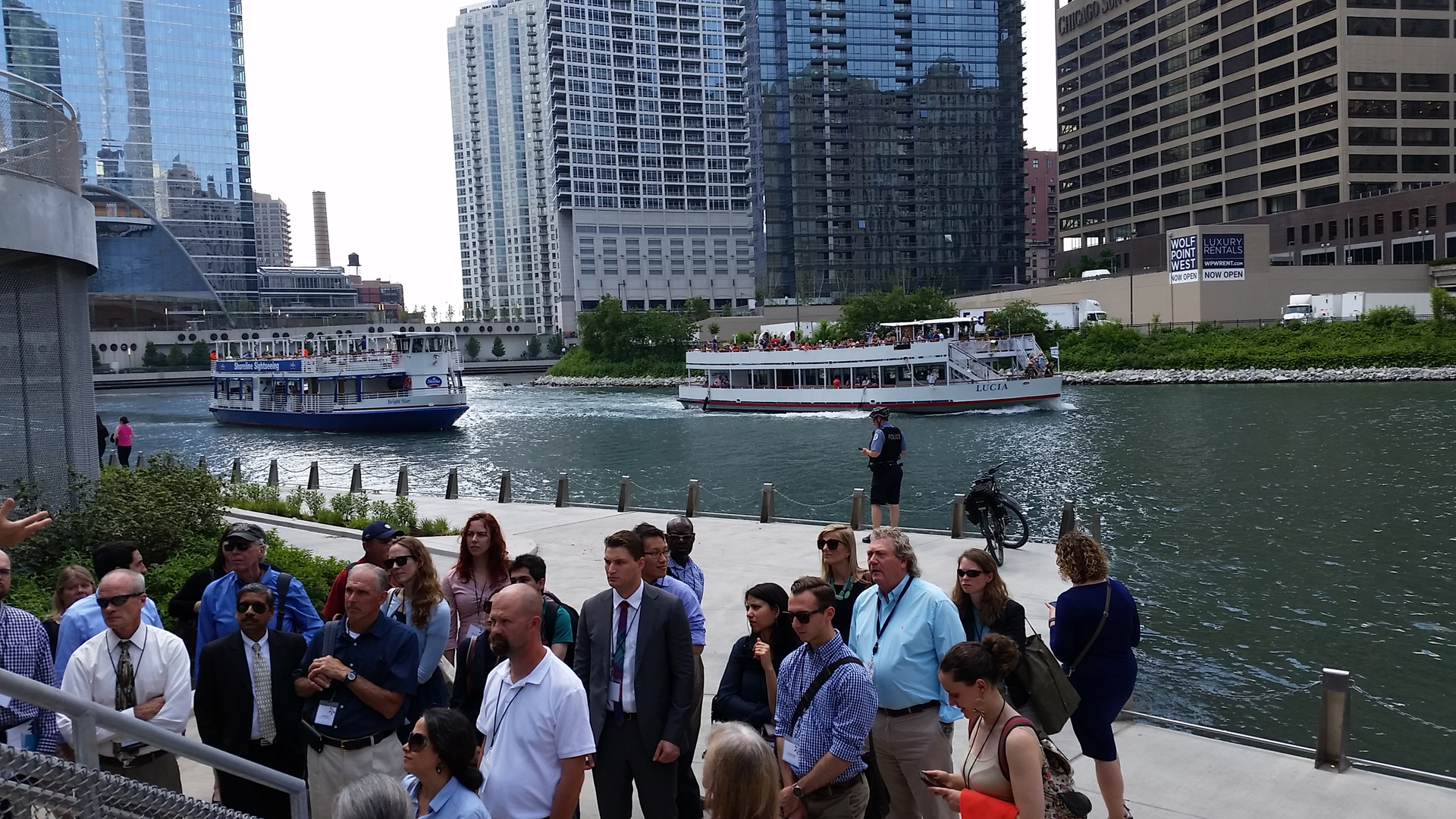 Attendees of Transport Chicago get a tour of the Chicago Riverwalk, which had its grand opening May, 2017.