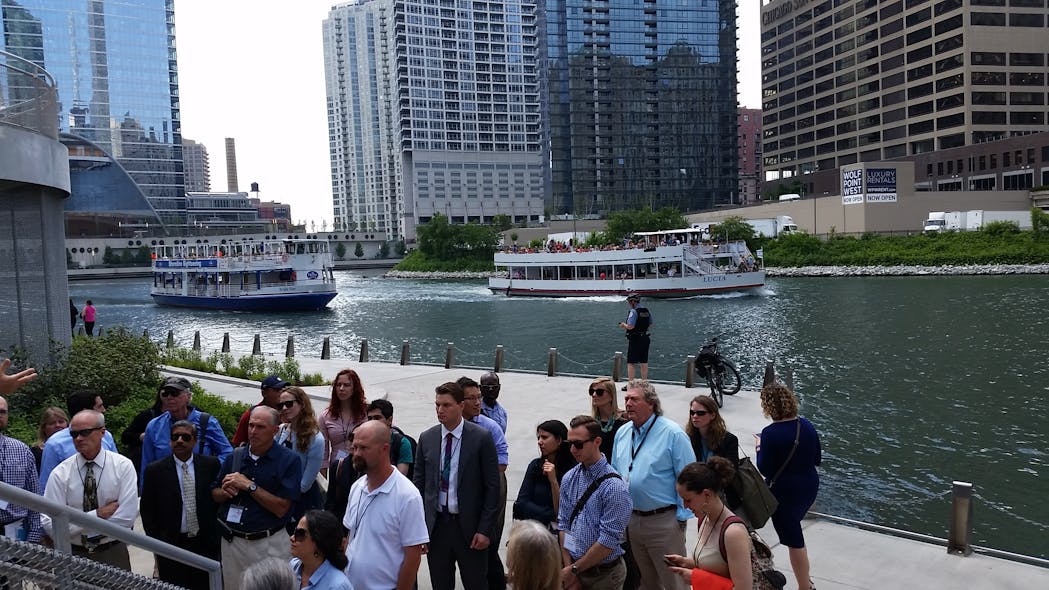 Attendees of Transport Chicago get a tour of the Chicago Riverwalk, which had its grand opening May, 2017.
