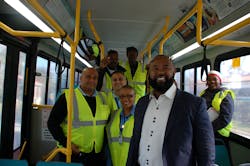 Clinton Forbes, Executive Director (right) poses with bus operators. Clinton Forbes, Executive Director (right) poses with bus operators.