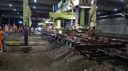 Amtrak’s Portal Krane (PK-1) positioning a switch for installation.