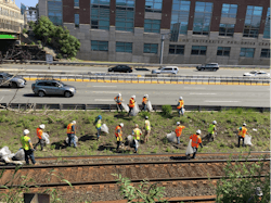 Crews collect trash between the Framingham/Worcester Line and the Massachusetts Turnpike. Crews collect trash between the Framingham/Worcester Line and the Massachusetts Turnpike.