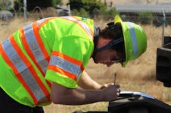 Colin McGill making notes in the field as part of his project with the Track Department. Colin McGill making notes in the field as part of his project with the Track Department.