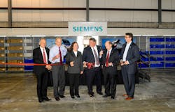 Members of Siemens’ Digital Rail Services team located in New Castle will remotely collect and analyze over 800 data points from each locomotive daily. Members of Siemens’ Digital Rail Services team located in New Castle will remotely collect and analyze over 800 data points from each locomotive daily.