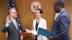 In this photo, Robert L. Sumwalt III (left) sworn in as the National Transportation Safety Board&rsquo;s 14th Chairman during a brief ceremony held at NTSB headquarters on August 10, 2017. NTSB Board Member Bella T. Dinh-Zarr (center) NTSB Acting Managing Director Dennis Jones (right).