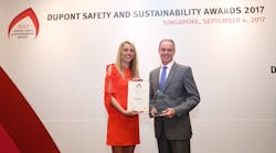 L to R: Mieke Jacobs, president of the Jury for the Dupont Safety and Sustainability Awards, presents the DuPont Global Safety Award to Mark Collins, BC Ferries&rsquo; president &amp; CEO.