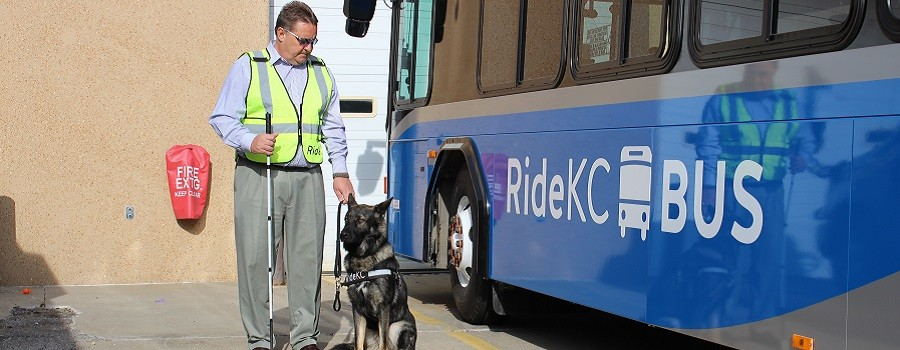 Robbie Makinen, chief executive of the Kansas City Area Transportation Authority, and his service dog Loki.