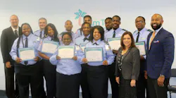 On the left, Director of Operations Sean Smith, and on the right, Assistant County Administrator Nancy Bolton and Executive Director Clinton B. Forbes gather alongside Palm Tran’s newest bus operator graduates.
