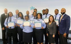 On the left, Director of Operations Sean Smith, and on the right, Assistant County Administrator Nancy Bolton and Executive Director Clinton B. Forbes gather alongside Palm Tran’s newest bus operator graduates. On the left, Director of Operations Sean Smith, and on the right, Assistant County Administrator Nancy Bolton and Executive Director Clinton B. Forbes gather alongside Palm Tran’s newest bus operator graduates.