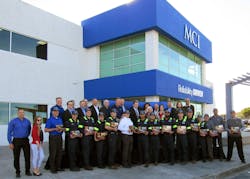 Motor Coach Industries (MCI) cuts ribbon at new San Francisco Bay Area sales and service center in Hayward, CA.